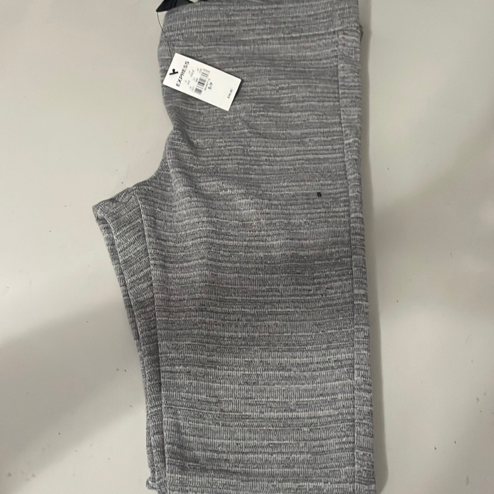 Never worn, with tags